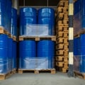 blue waste drums carefully stored for shipping