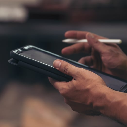 worker on tablet accessing customer gateway