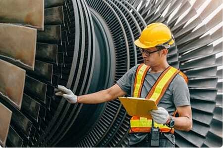 Industrial facility equipment illustrating energy recovery from waste materials.