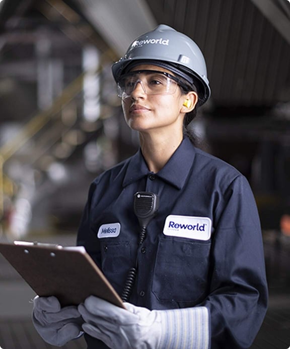 Reworld employee reviewing compliance performance.