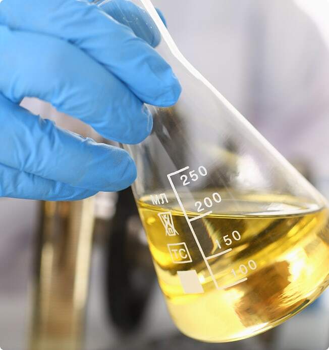 Testing chemicals in laboratory.