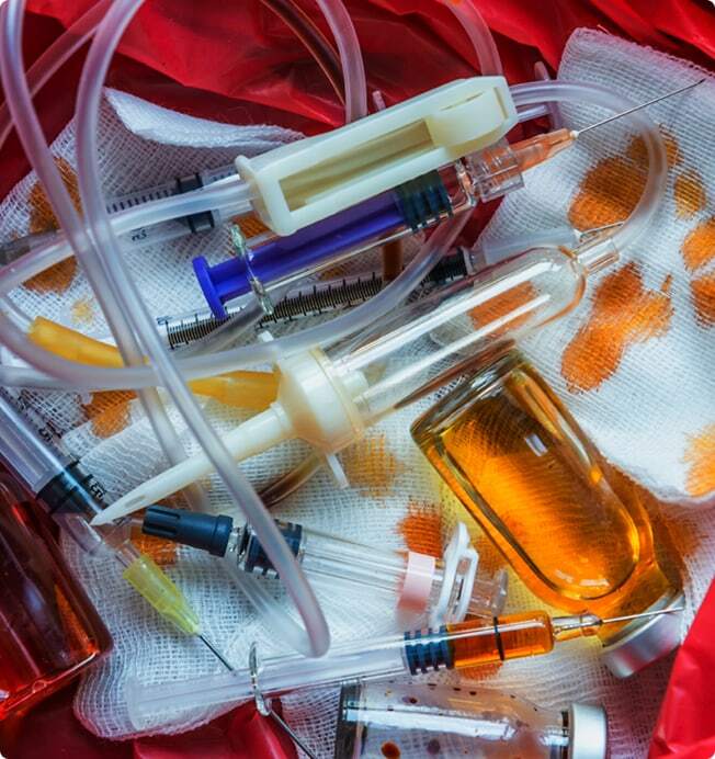 A variety of healthcare waste, including pharmaceuticals, sharps and regulated medical waste.
